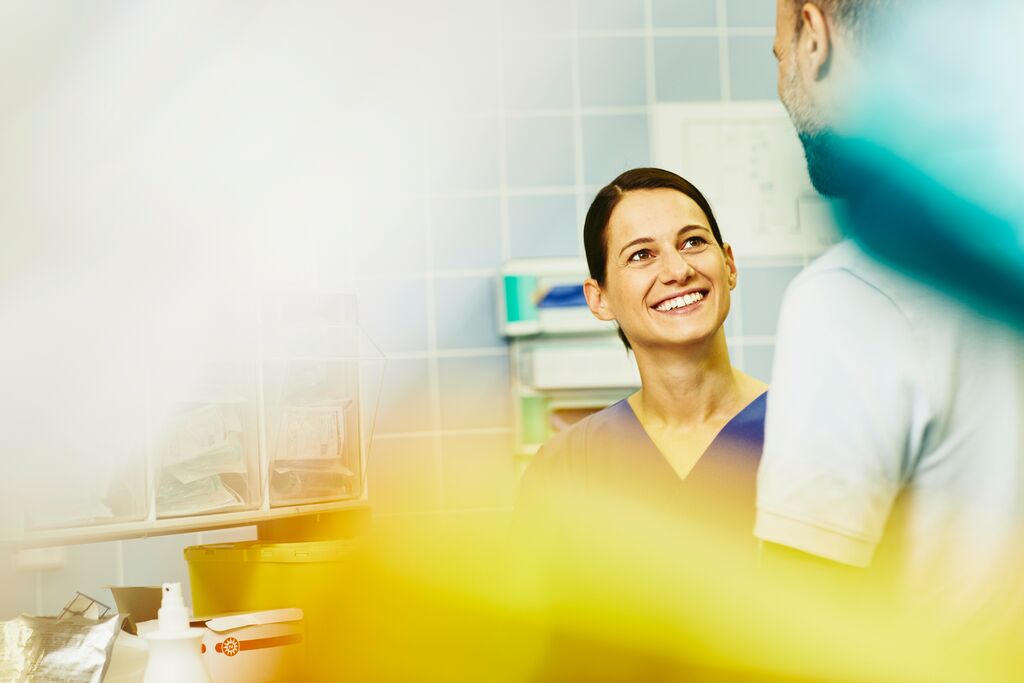 Nurse Talking and Smiling