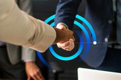 two people shaking hands