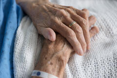 An elderly person in bed