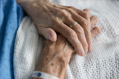 An elderly person in bed