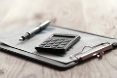 A calculator and a notepad