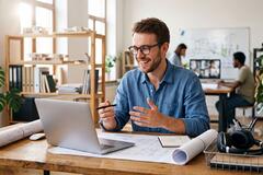 Male Engineer video call laptop