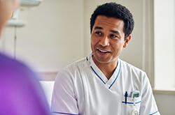 nurse discussing with a patient out of shot