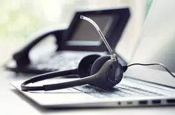 VOIP headset headphones telephone and laptop concept for communication, it support, call center and customer service help desk
