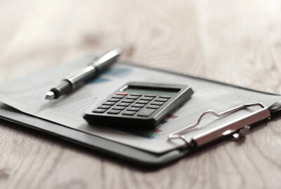 A calculator and a notepad