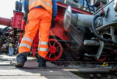 Railway worker in action at railway station