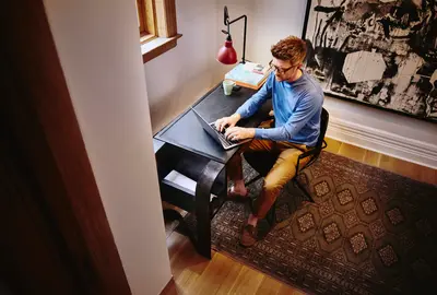 a person giving intervew on skype