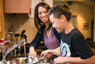 mum washing up with her son
