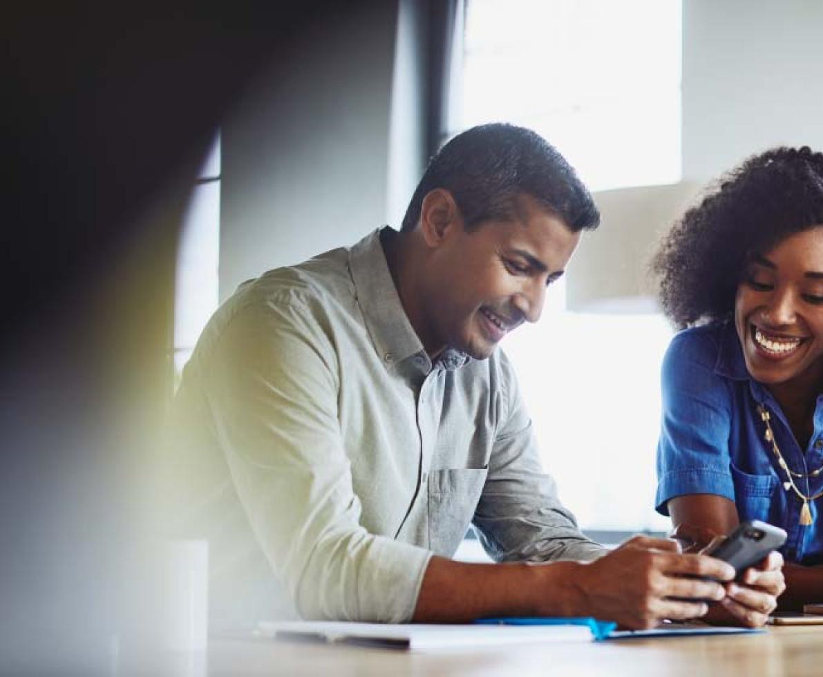 man and woman at desk