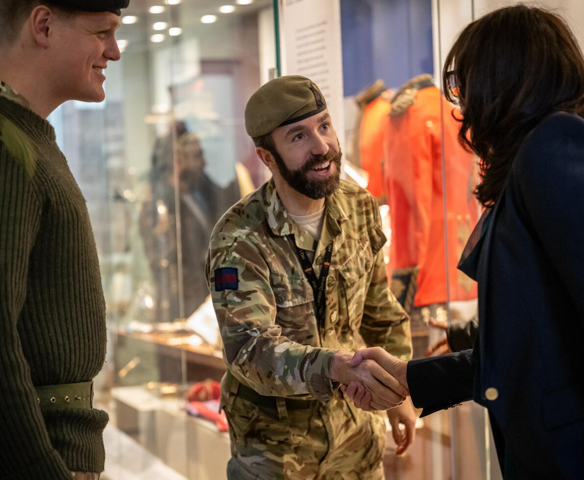 Victoria Short, Randstad CEO shaking hands with a veteran