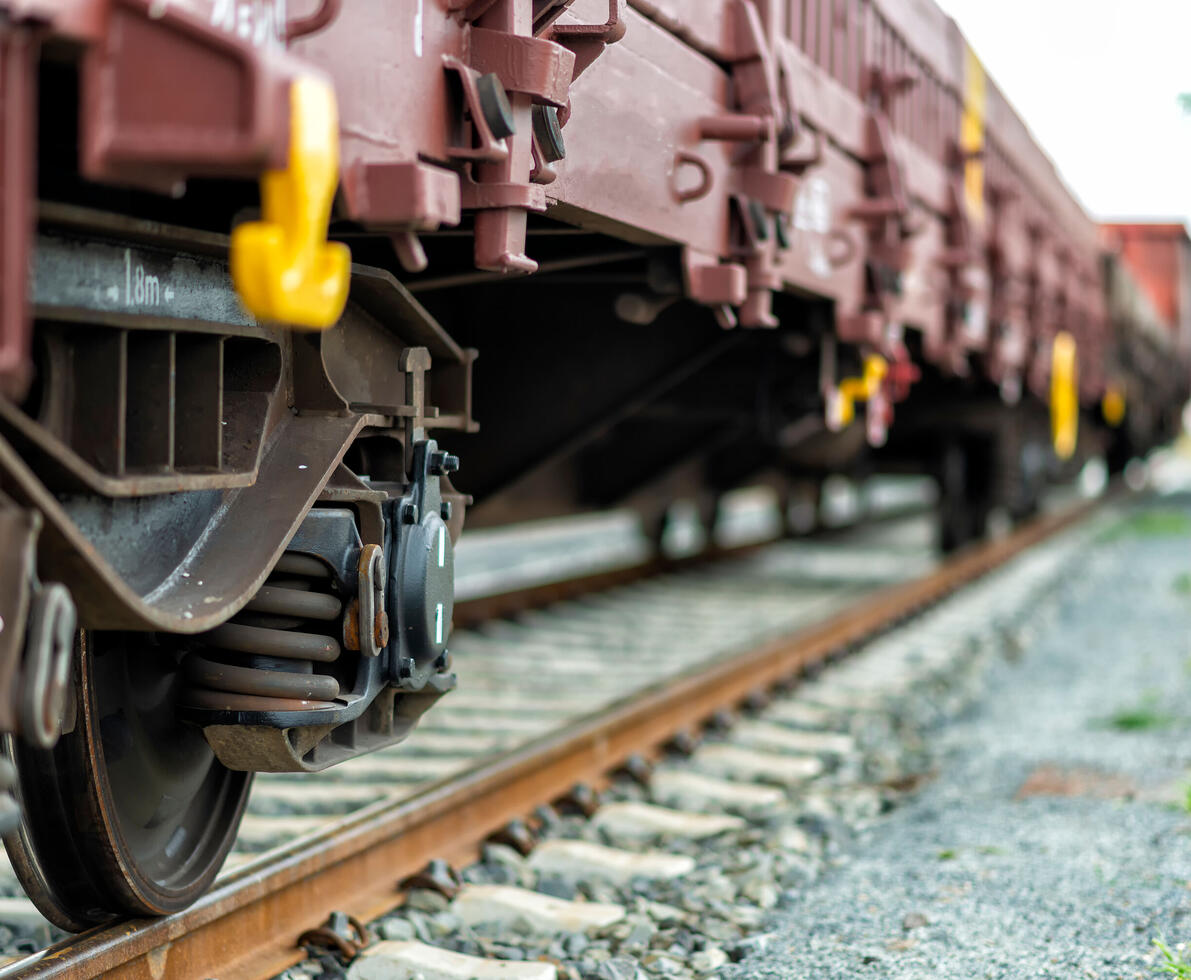 Freight train with freight wagons on a track