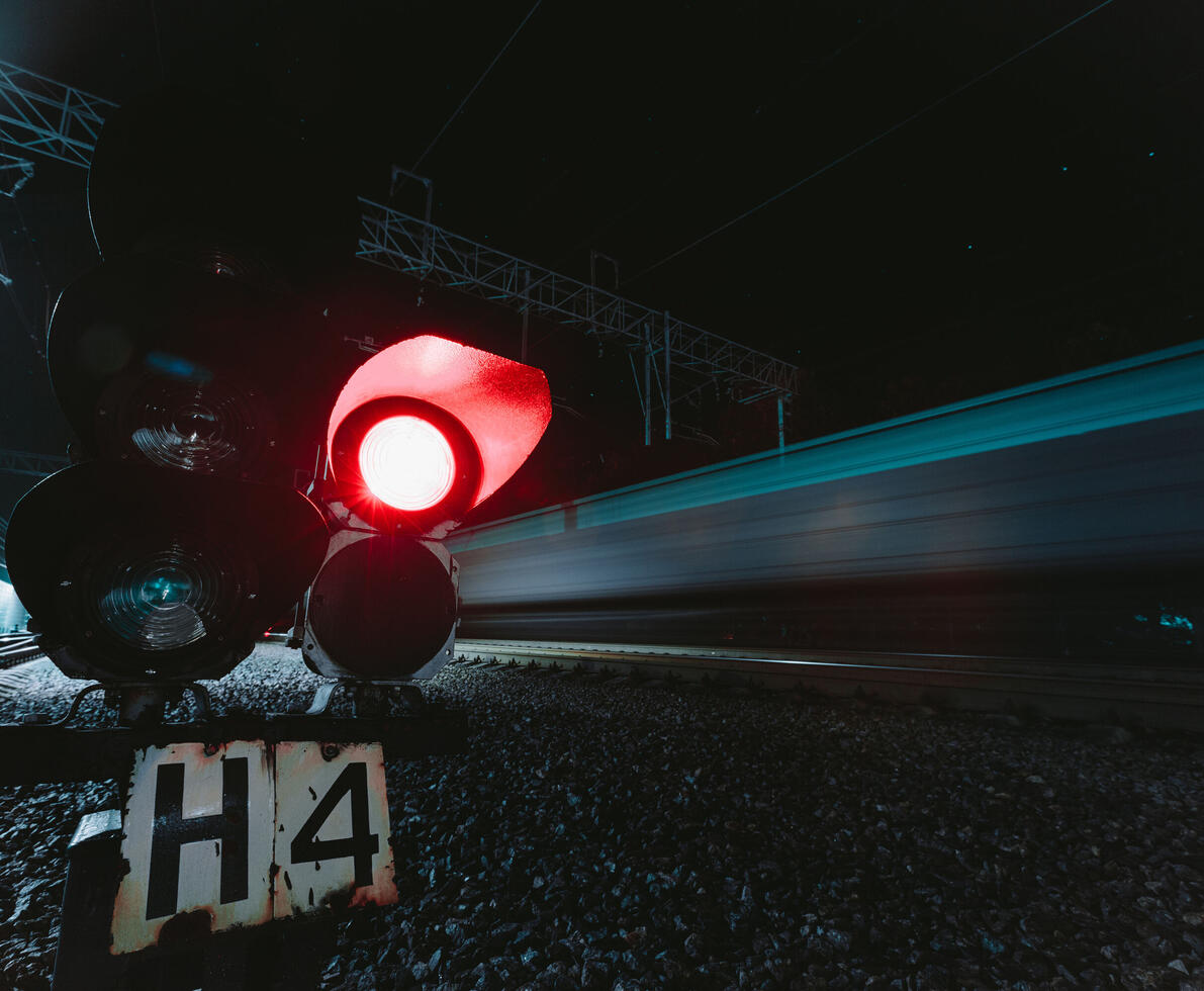 Red semaphore railway at night