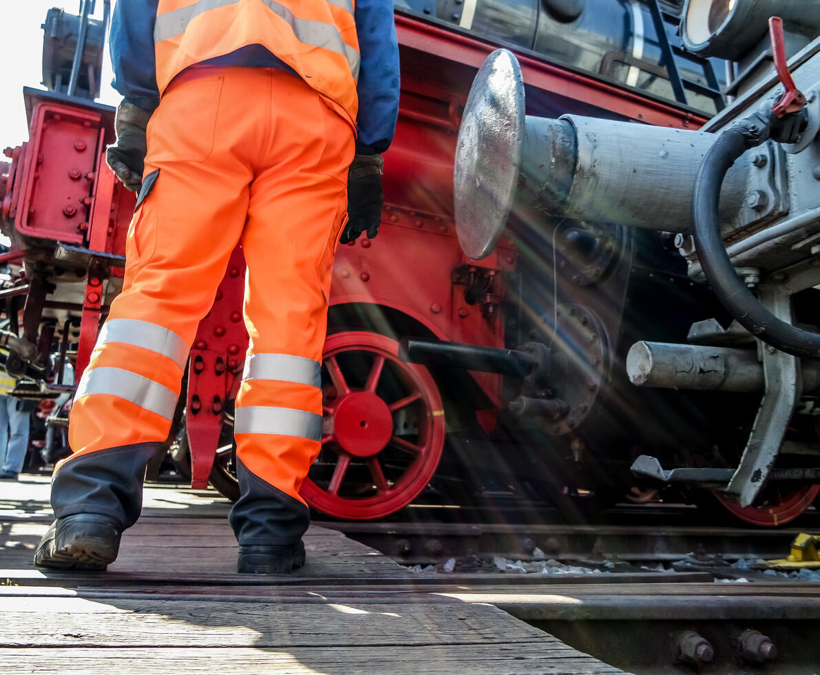 Railway worker in action at railway station