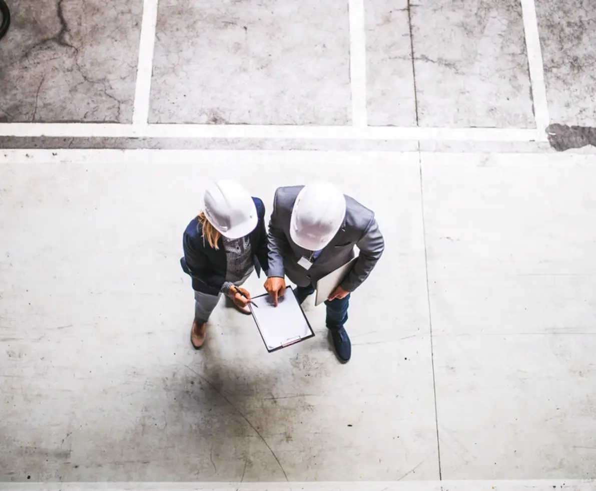 two engineers working on a site
