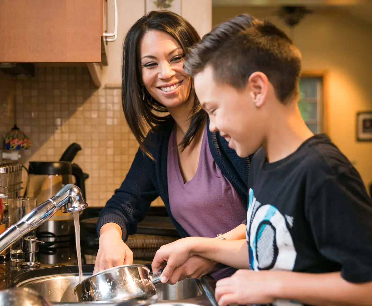 mum washing up with her son