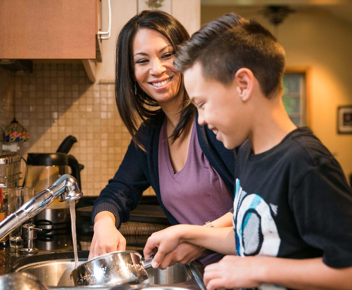 mum washing up with her son