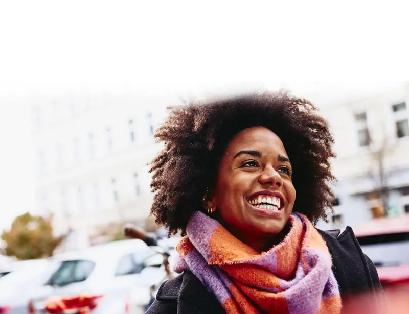 Woman smiling outside